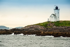 Two Bush Island Light Over Rocky Shore in Midcoast Maine